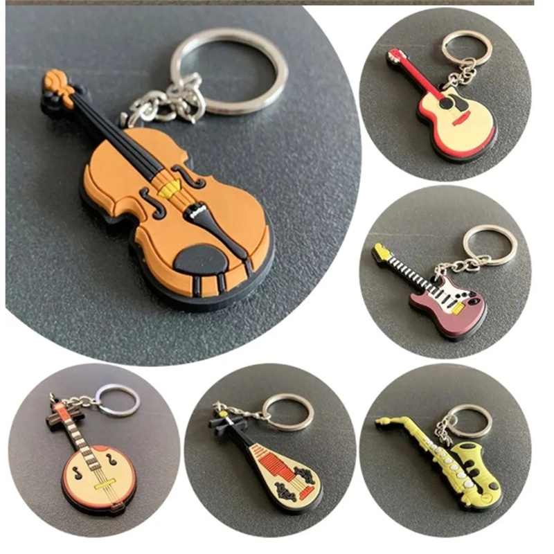 新着ギターキーホルダー男性女性パンクバイオリン楽器シリコーン - Musical Instrument Photo のレビューと価格